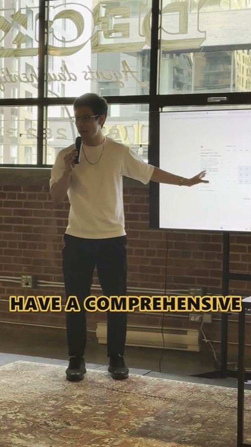 Sunwoong on a microphone presenting at the AI agent workshop.